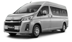 Toyota Hiace kendaraan minibus putih 